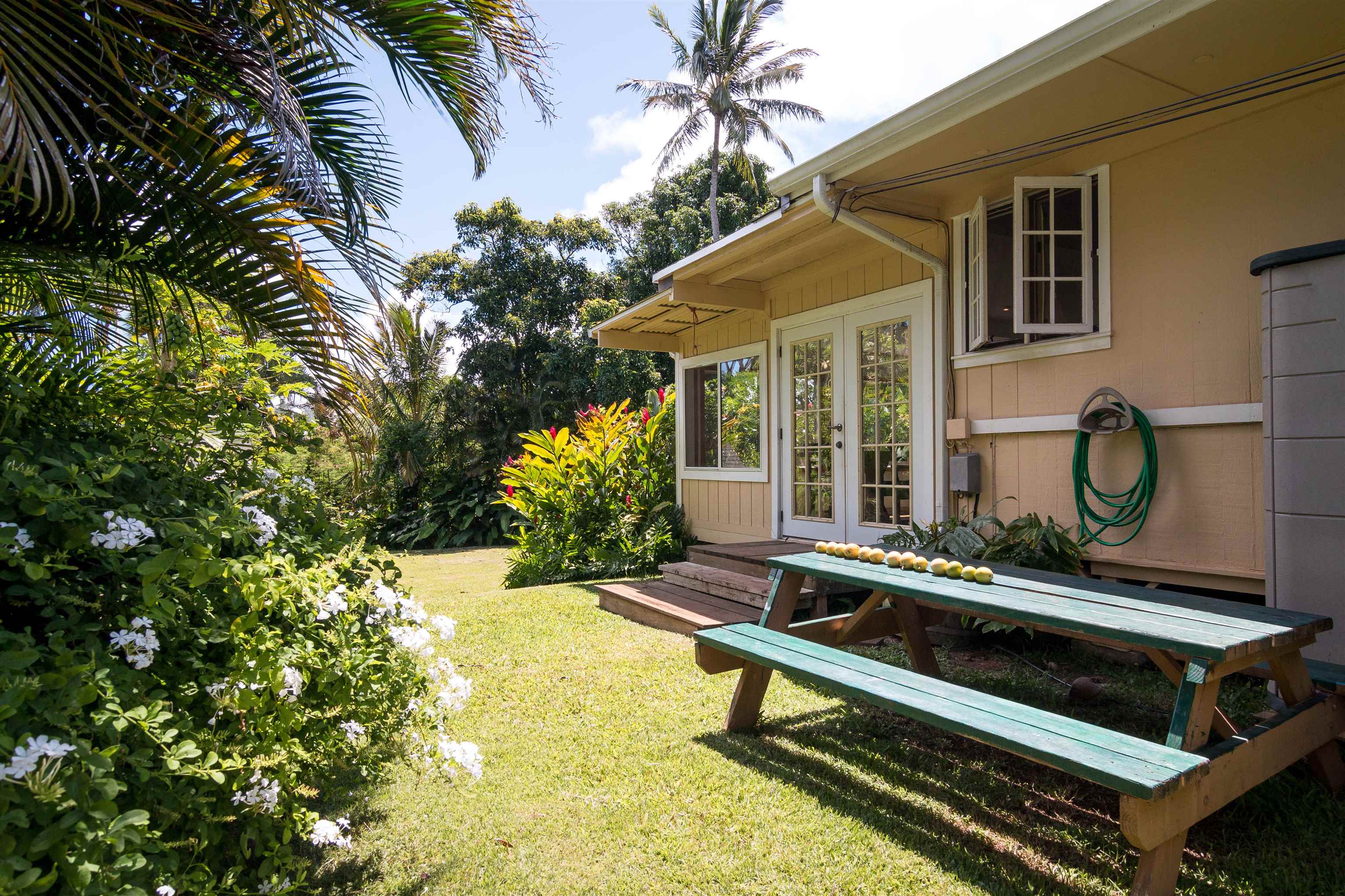 3245 Luahine Place Haiku, HI 96708 - Photo 2 of 10 a view of a backyard with sitting area