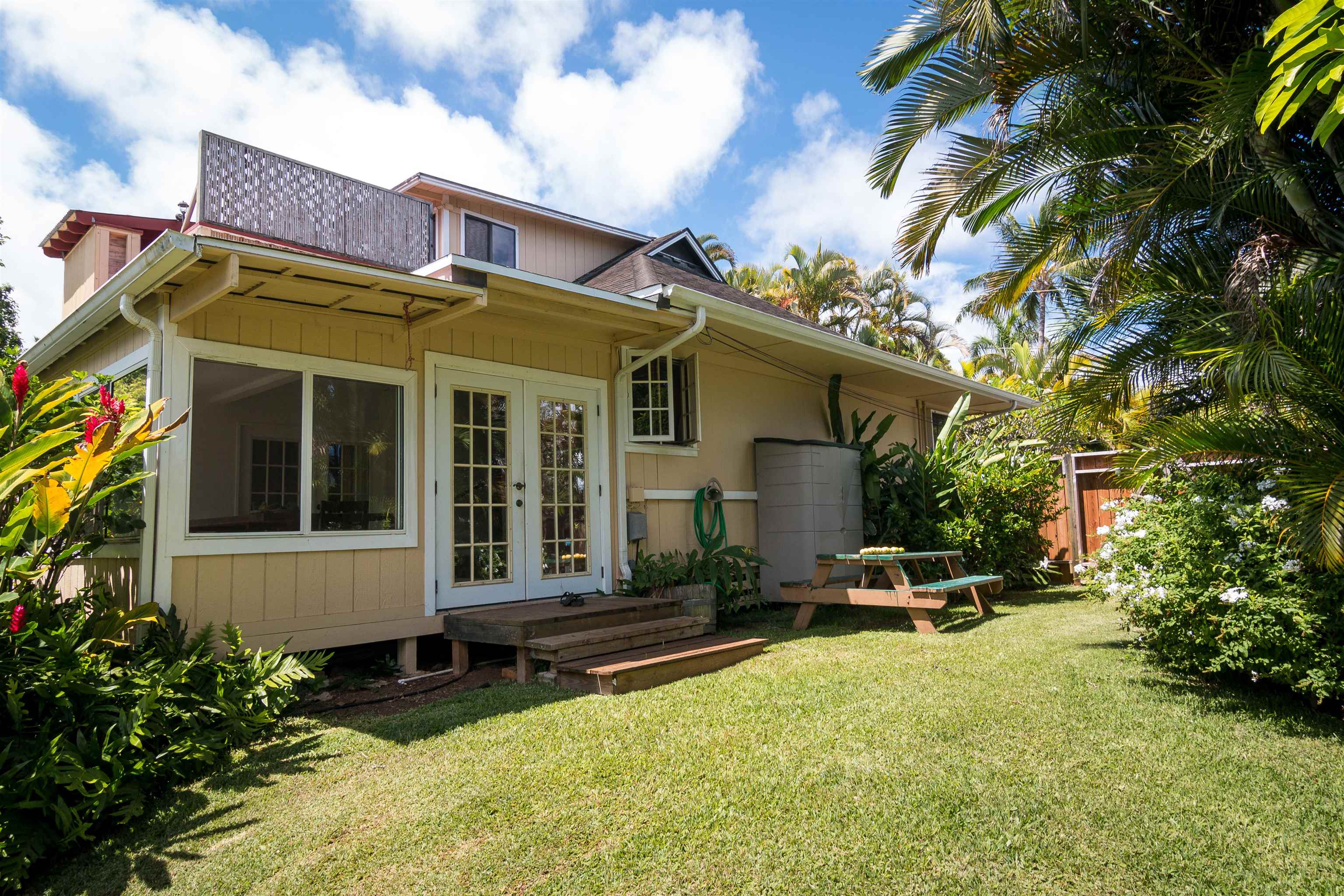 3245 Luahine Place Haiku, HI 96708 - Photo 3 of 10 a view of a house with a patio