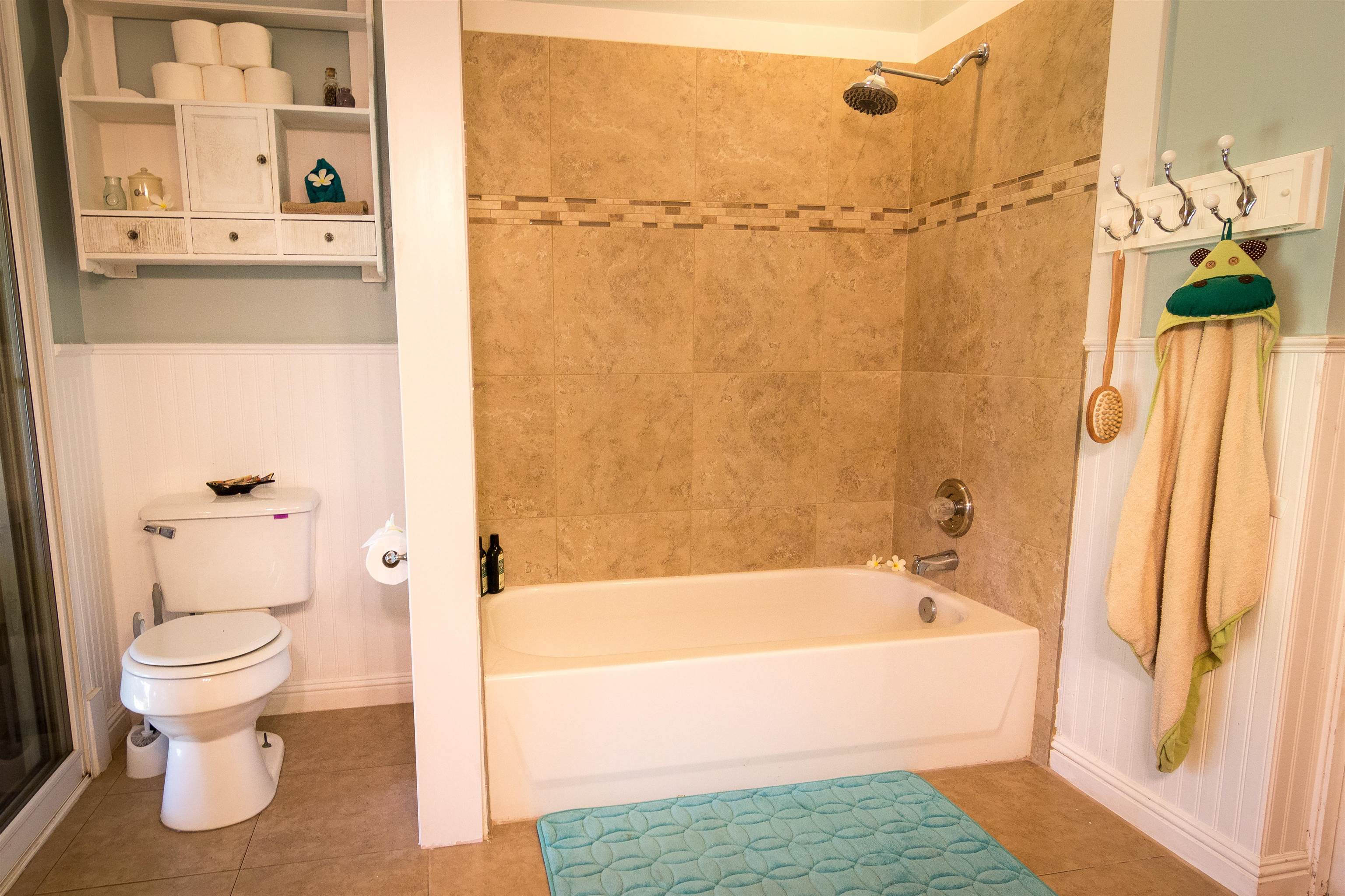 3245 Luahine Place Haiku, HI 96708 - Photo 8 of 10 a bathroom with a shower a toilet and a shower