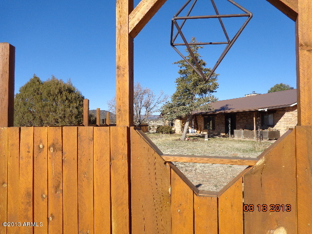 313 Zachariae Ranch Road Young, AZ 85554 - Photo 2 of 16 fence - front yard