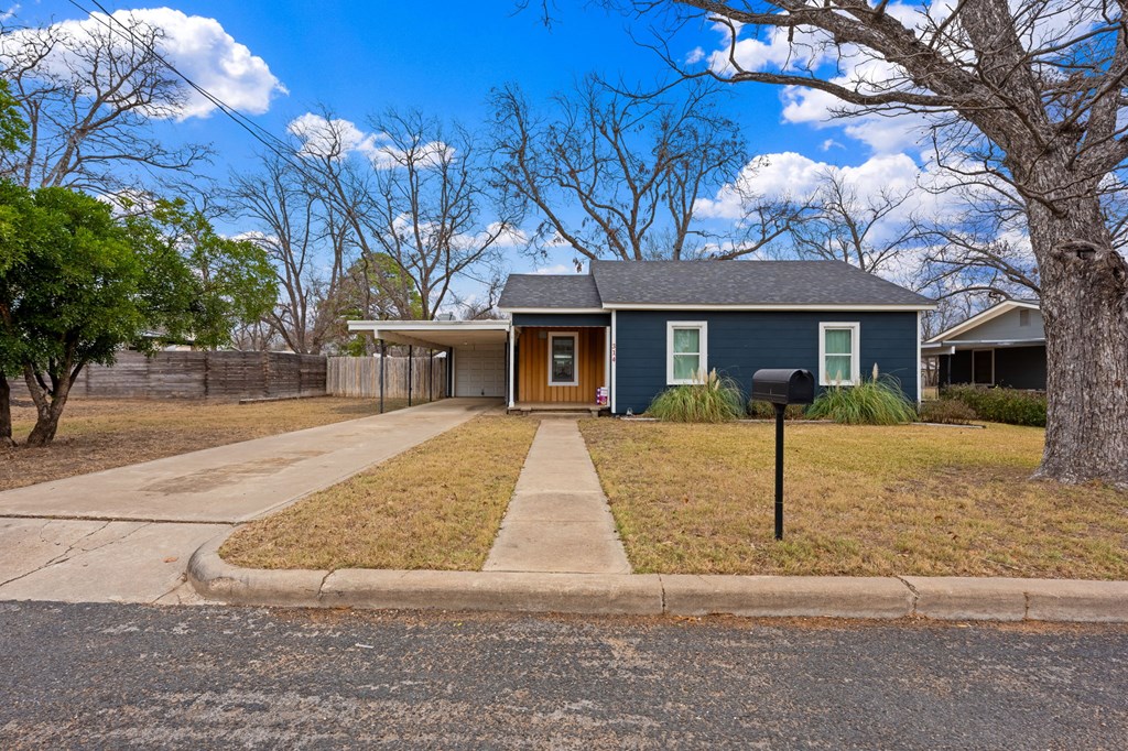 314 West Hackberry Street Fredericksburg, TX 78624 - Photo 3 of 25 a front view of house with yard