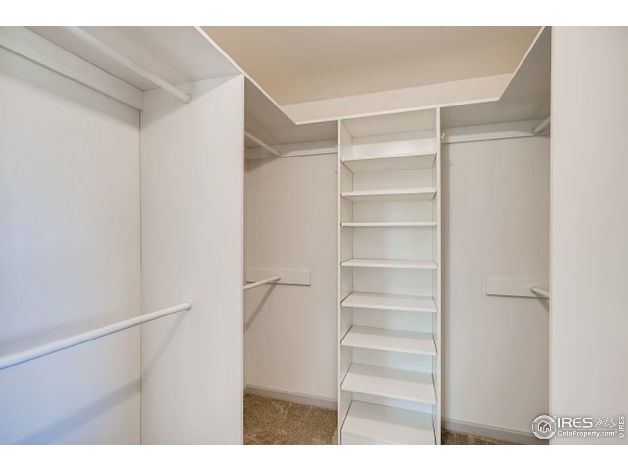 13165 East County Line Road Longmont, CO 80504 - Photo 30 of 39 Primary bedroom closet.