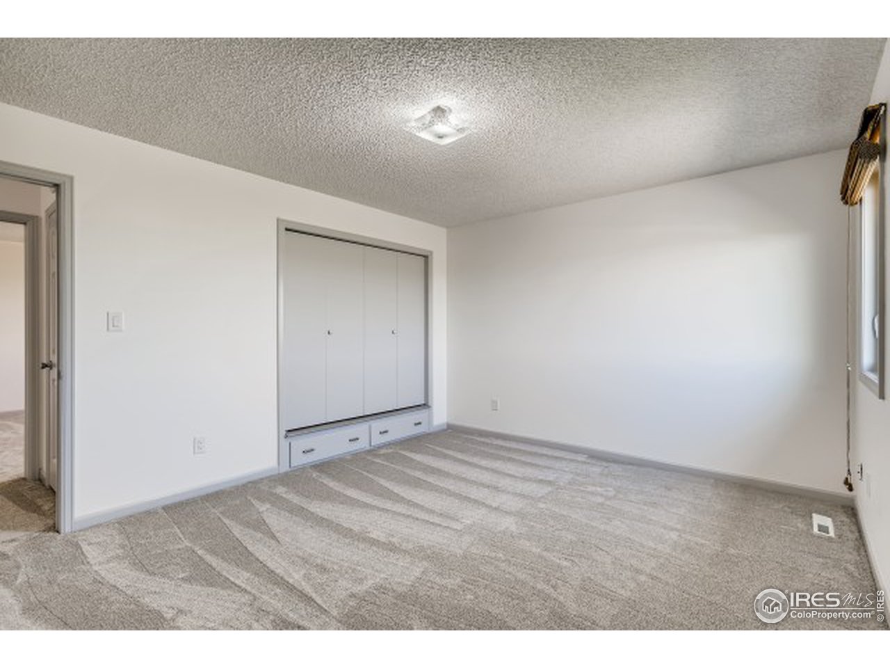 13165 East County Line Road Longmont, CO 80504 - Photo 33 of 39 New carpet and doors throughout.