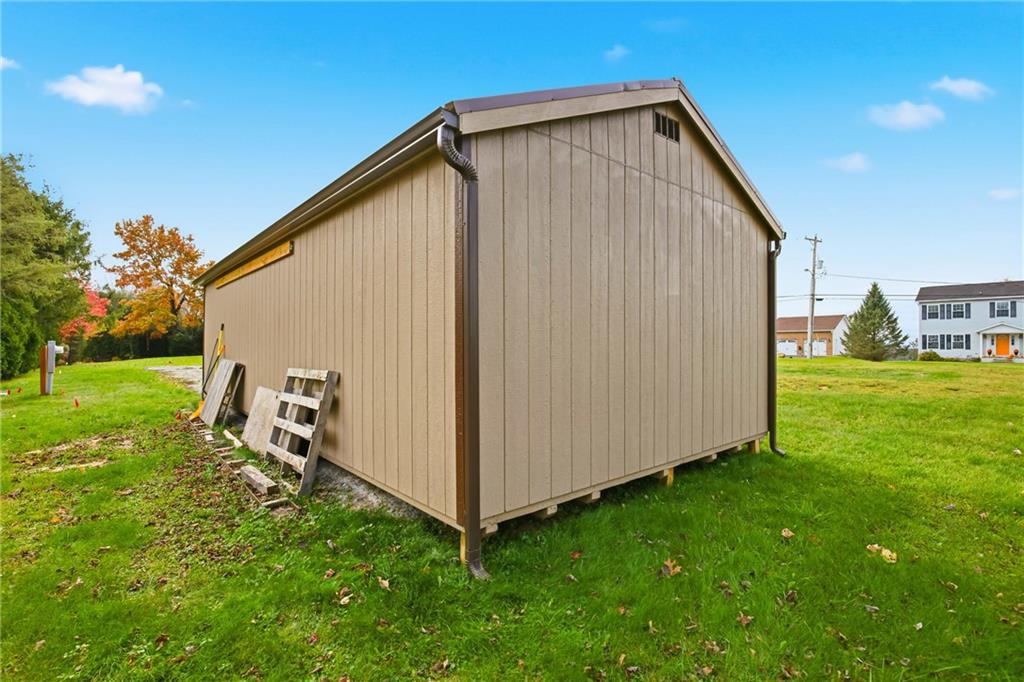 1607 Crestview Drive Somerset, PA 15501 - Photo 4 of 15 a view of backyard with garden and deck
