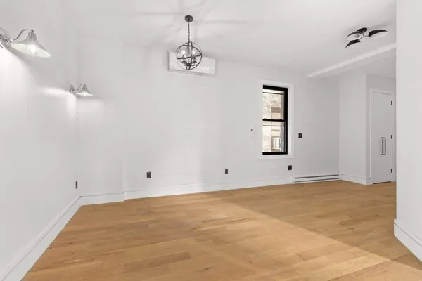 a kitchen with a sink cabinets and stainless steel appliances