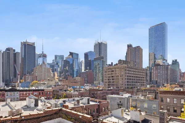 a view of a city with tall buildings
