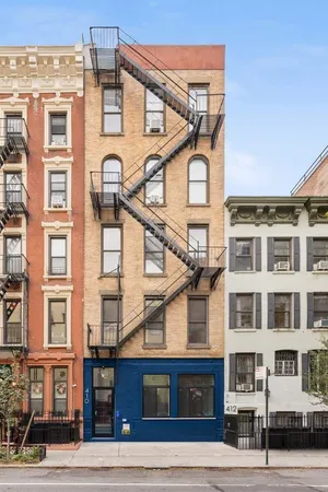 a view of a city with tall buildings