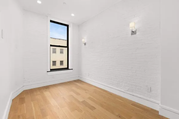 a bathroom with a sink toilet and vanity