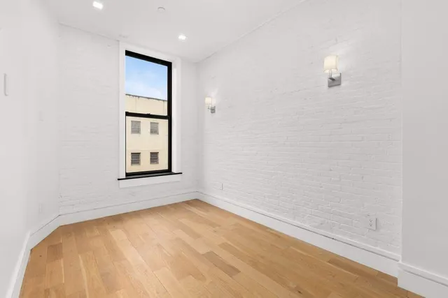a bathroom with a sink toilet and vanity