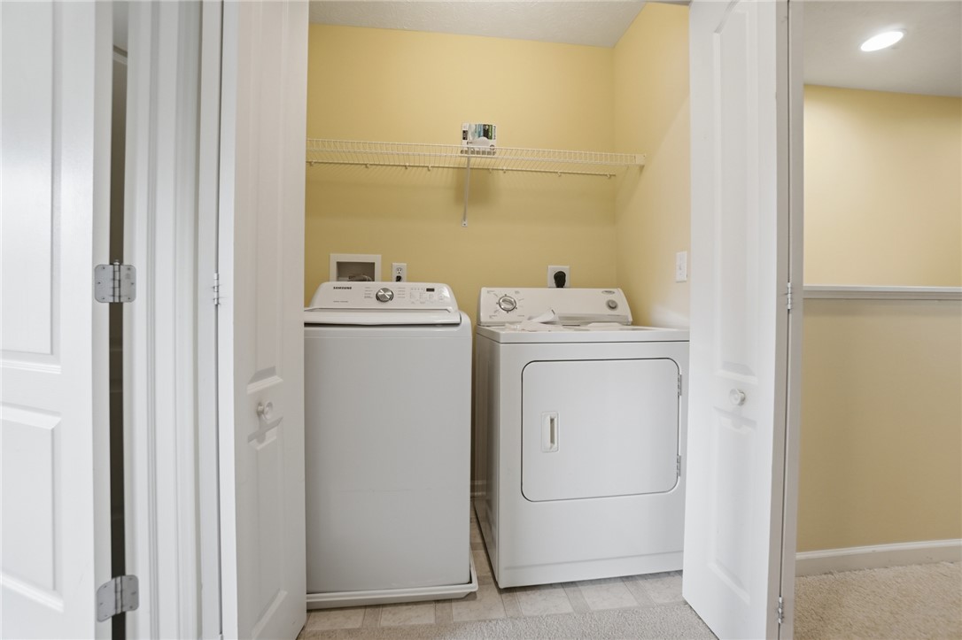 4324 Straight Arrow Road Dayton, OH 45430 - Photo 29 of 40 This dedicated laundry space combines practicality with comfort for everyday living.