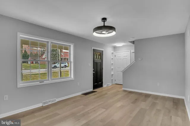 an empty room with windows