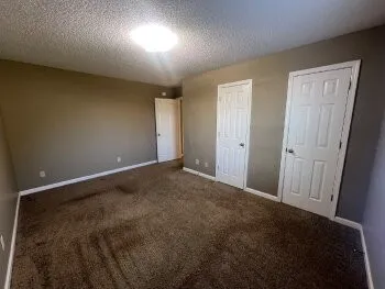 en empty room with windows