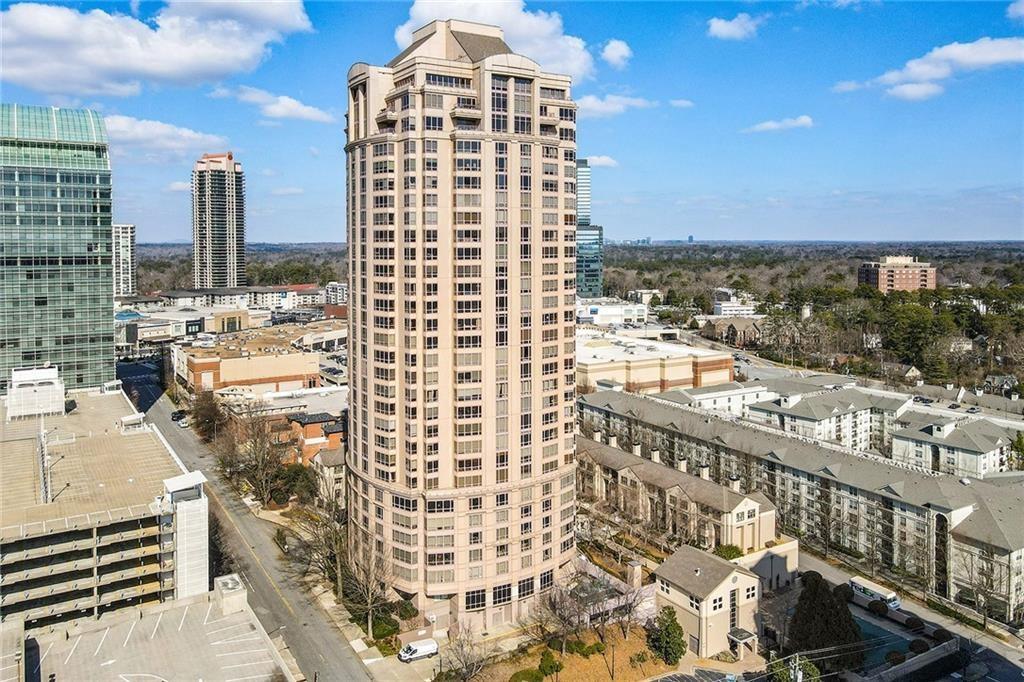 3475 Oak Valley Road Northeast, Unit 1930 Atlanta, GA 30326 - Photo 1 of 29 a view of a city with tall buildings