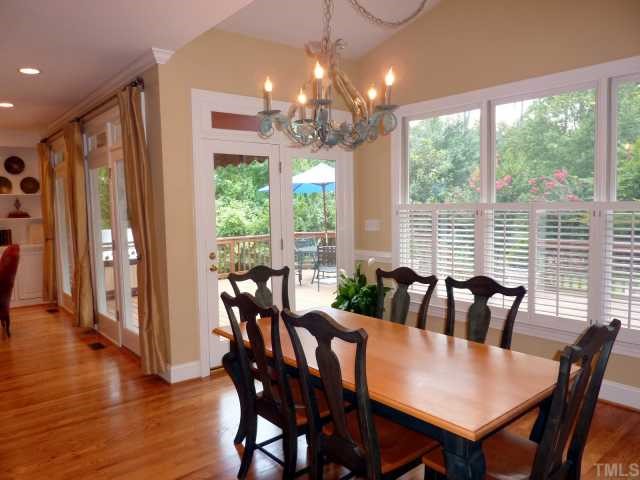 4617 White Chapel Way Raleigh, NC 27615 - Photo 3 of 12 a view of a dining room with furniture window and outside view