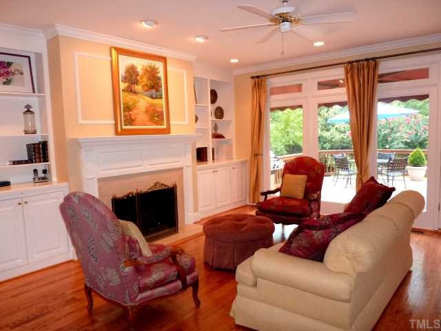 4617 White Chapel Way Raleigh, NC 27615 - Photo 4 of 12 a living room with furniture and a fireplace