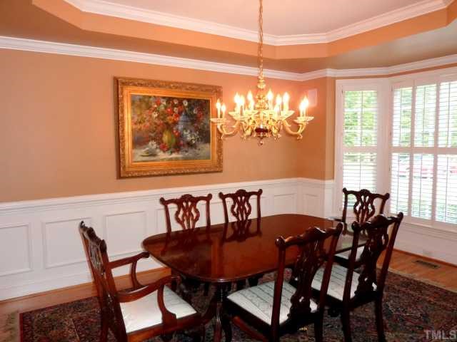 4617 White Chapel Way Raleigh, NC 27615 - Photo 5 of 12 a view of a dining room with furniture window and outside view