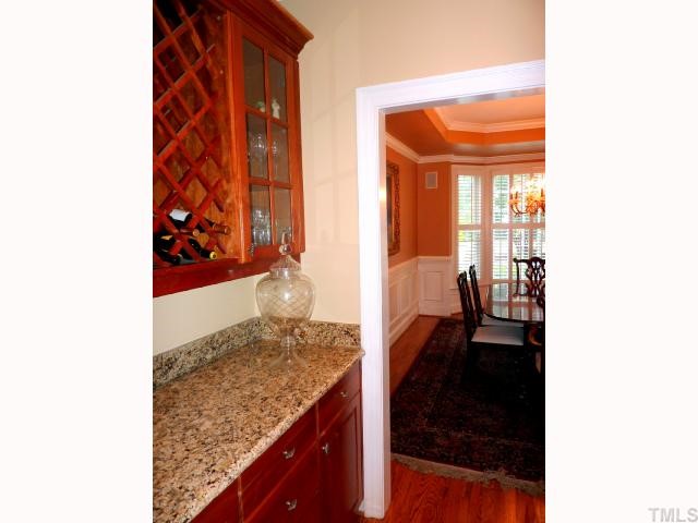 4617 White Chapel Way Raleigh, NC 27615 - Photo 6 of 12 a view of living room with a sink and cabinets