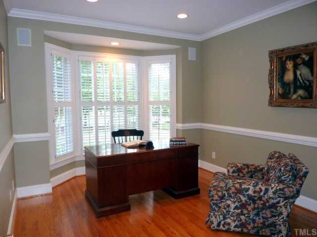 4617 White Chapel Way Raleigh, NC 27615 - Photo 9 of 12 a living room with furniture and a large window