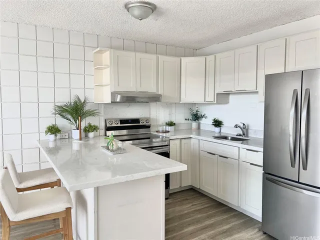 a large white building with blue walls and white walls