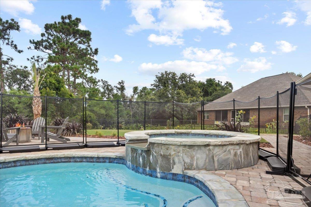 7191 Apples Way Navarre, FL 32566 - Photo 11 of 54 a view of outdoor space with swimming pool and patio