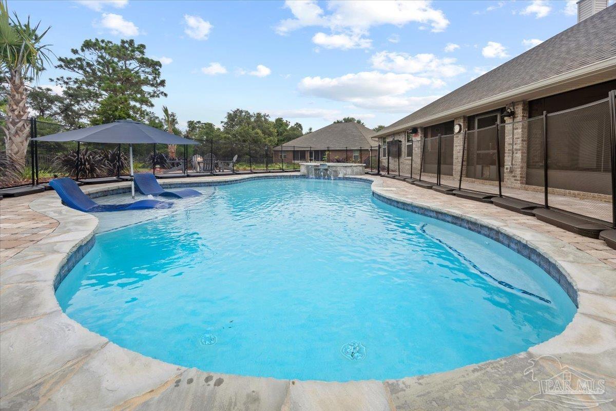 7191 Apples Way Navarre, FL 32566 - Photo 10 of 54 a view of a house with sitting area and furniture