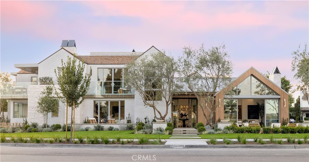 1399 Galaxy Drive Newport Beach, CA 92660 - Photo 1 of 39 a front view of a house with garden