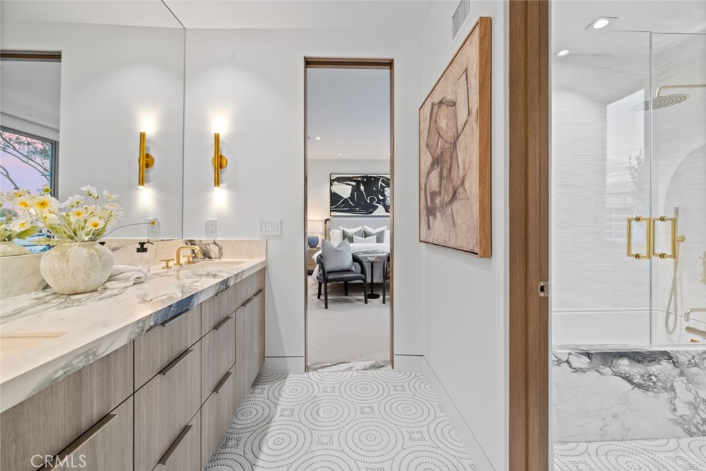 1399 Galaxy Drive Newport Beach, CA 92660 - Photo 14 of 39 a bathroom with a sink and a mirror