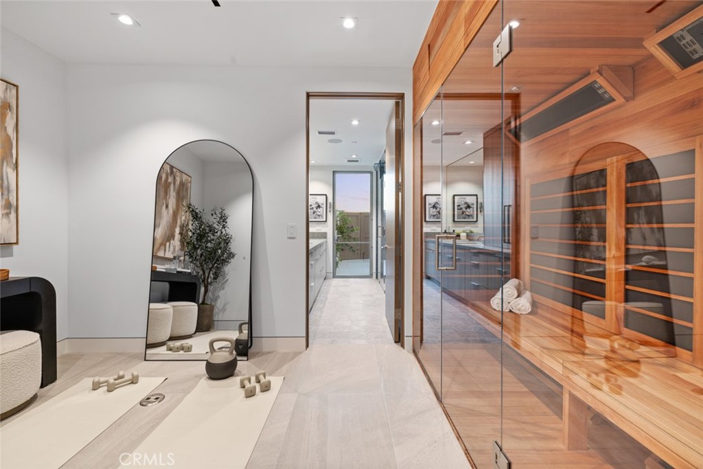 1399 Galaxy Drive Newport Beach, CA 92660 - Photo 17 of 39 a bathroom with a tub mirror and sink