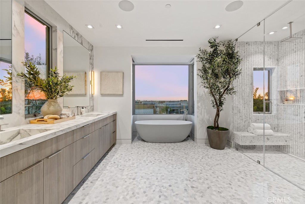 1399 Galaxy Drive Newport Beach, CA 92660 - Photo 25 of 39 a large white kitchen with a large tub and sink