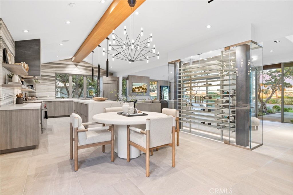 1399 Galaxy Drive Newport Beach, CA 92660 - Photo 3 of 39 a very nice looking living room with a large dining table and a large window