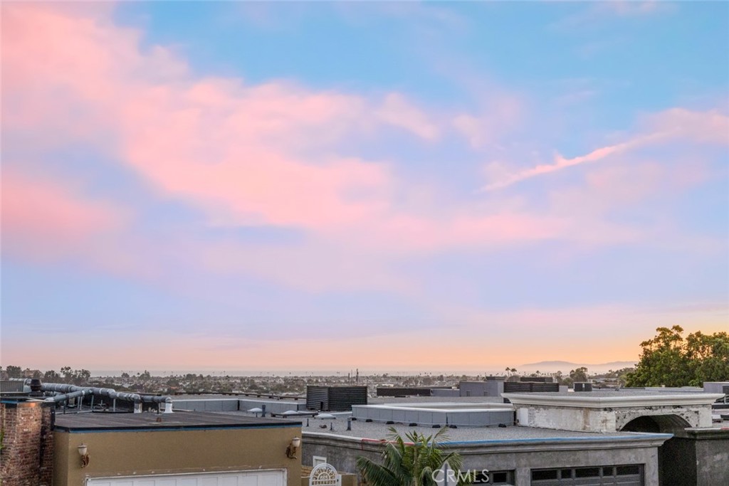 1399 Galaxy Drive Newport Beach, CA 92660 - Photo 31 of 39 a view of a lake and a city