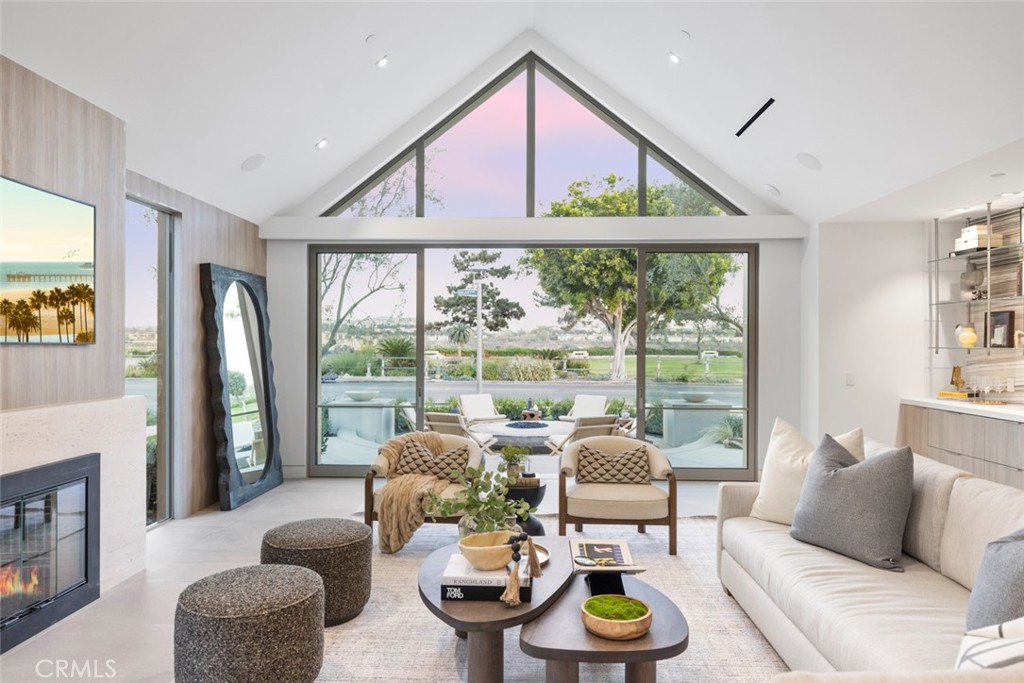 1399 Galaxy Drive Newport Beach, CA 92660 - Photo 5 of 39 a living room with furniture and a large window