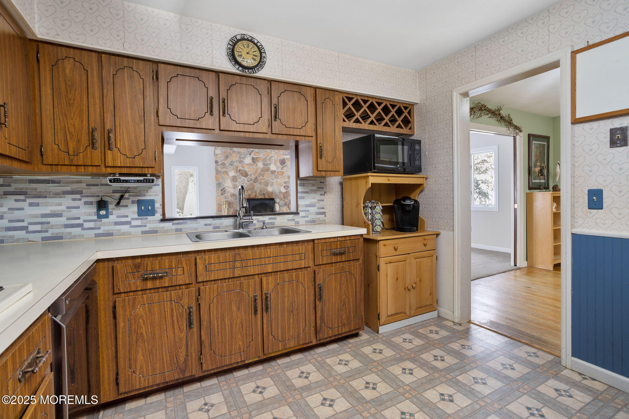 3 Tower Road Allentown, NJ 08501 - Photo 11 of 49 a kitchen with granite countertop a sink cabinets stainless steel appliances and a counter top space