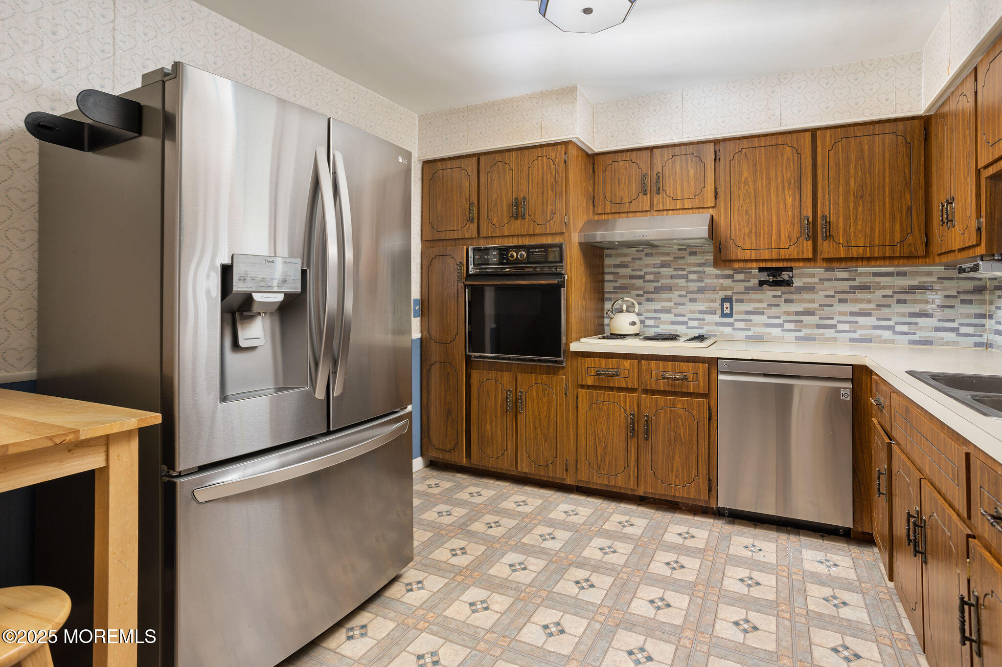 3 Tower Road Allentown, NJ 08501 - Photo 12 of 49 a kitchen with stainless steel appliances granite countertop a refrigerator and a sink