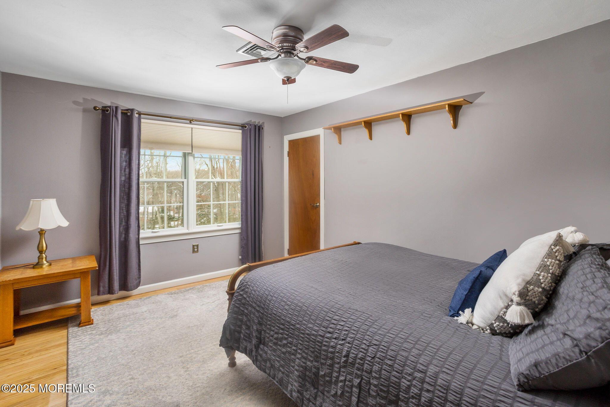 3 Tower Road Allentown, NJ 08501 - Photo 24 of 49 a bedroom with a bed and a lamp on table