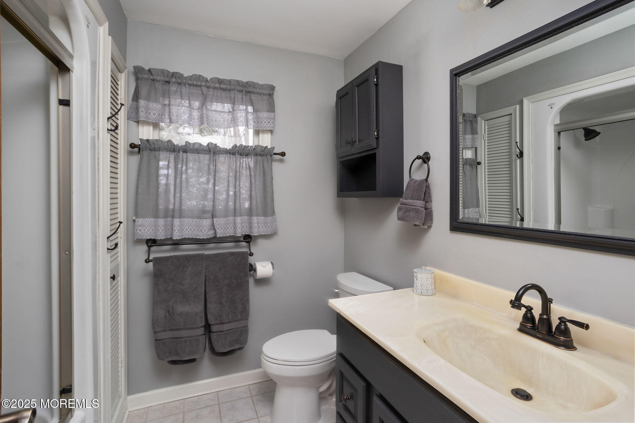 3 Tower Road Allentown, NJ 08501 - Photo 27 of 49 a bathroom with a sink toilet and shower