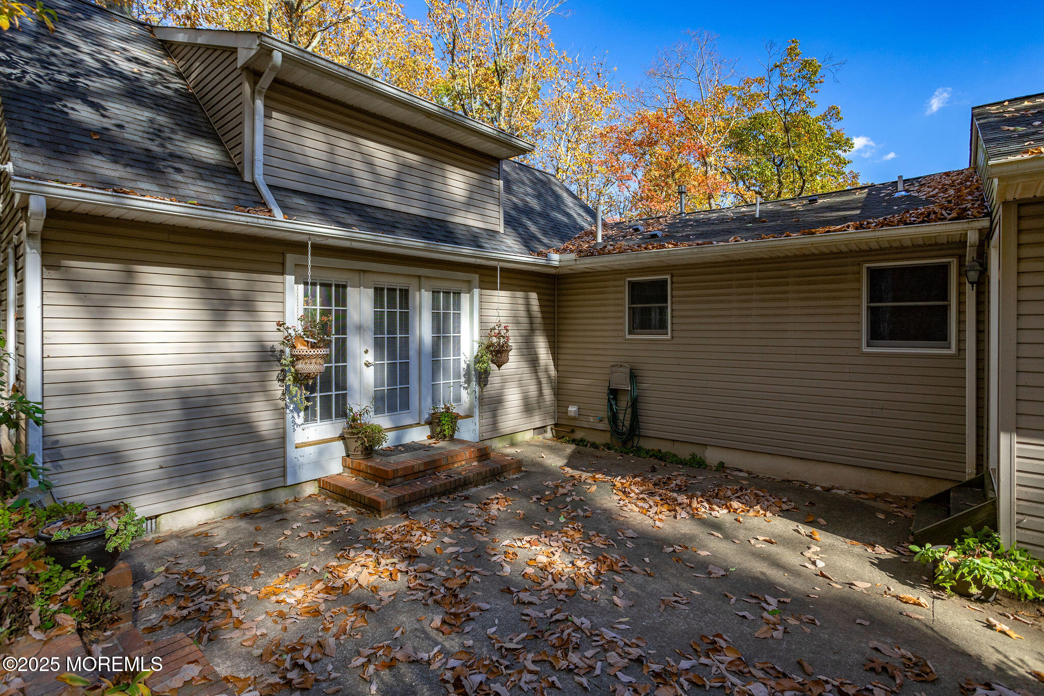 3 Tower Road Allentown, NJ 08501 - Photo 48 of 49 a backyard of a house with yard and outdoor seating