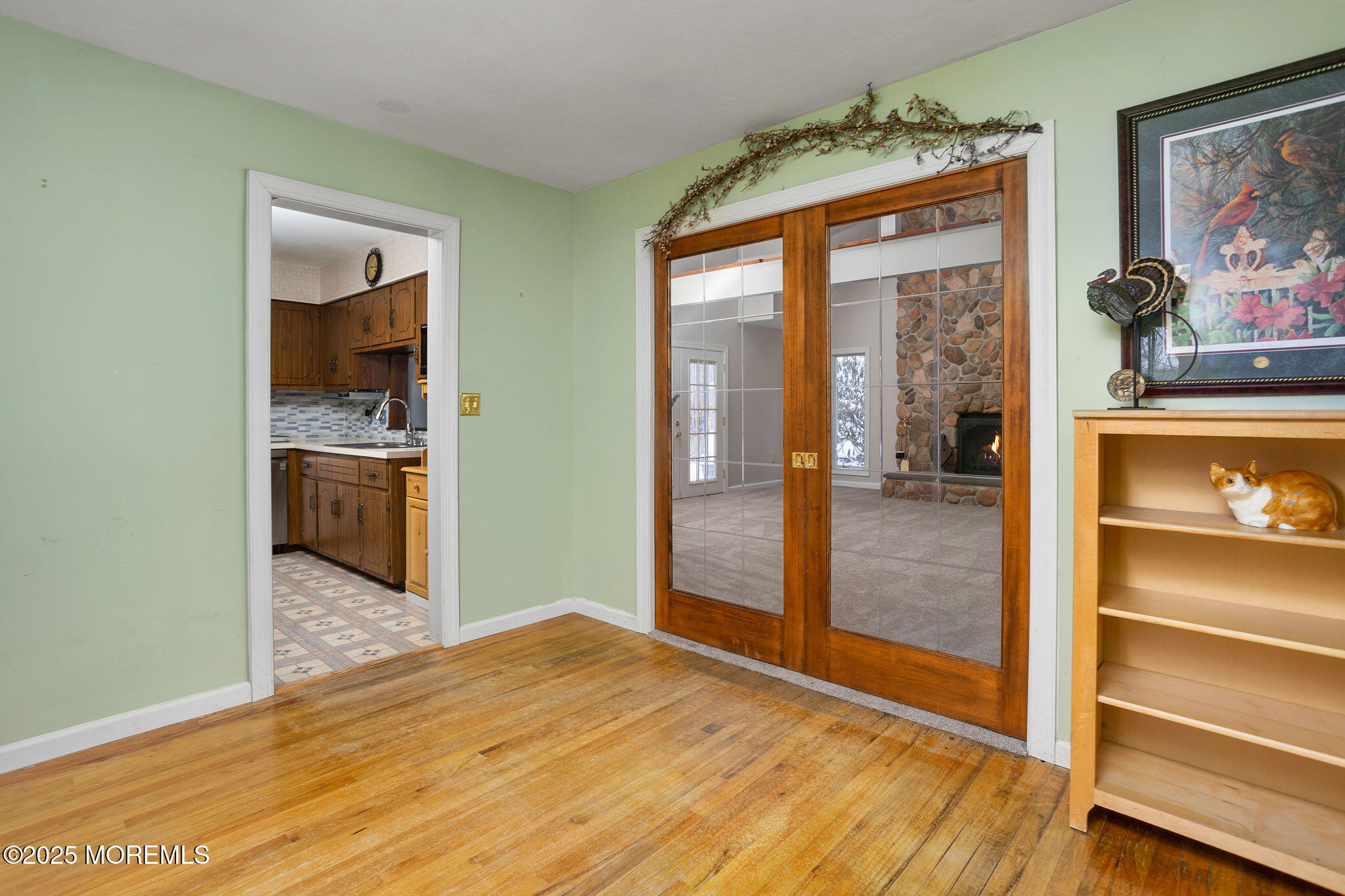 3 Tower Road Allentown, NJ 08501 - Photo 6 of 49 a view of a hallway with wooden floor and cabinet