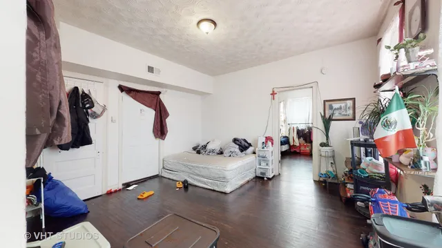 a bedroom with furniture and a couch