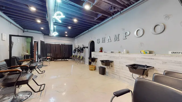 a view of a kitchen tables and chairs in a room
