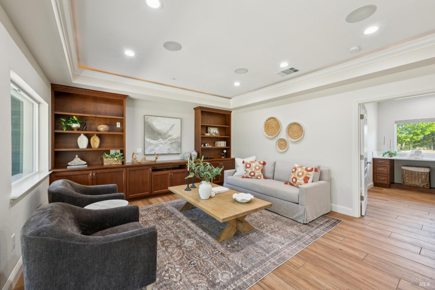 4665 Upper Ridge Road Santa Rosa, CA 95404 - Photo 22 of 71 a living room with furniture and a wooden floor