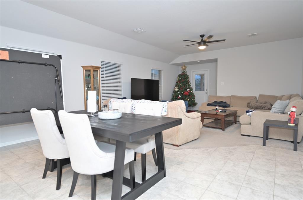 3713 Ridgeway Lane Argyle, TX 76226 - Photo 11 of 40 a view of a dining room with furniture