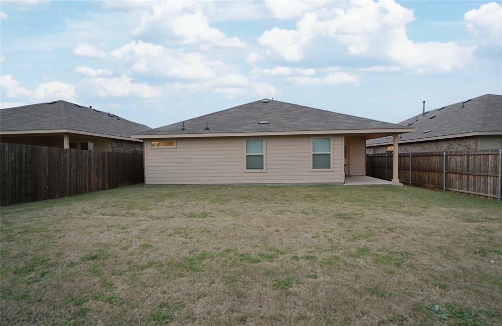 3713 Ridgeway Lane Argyle, TX 76226 - Photo 35 of 40 a backyard of a house