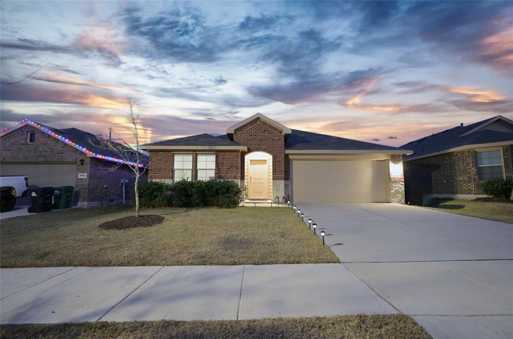 3713 Ridgeway Lane Argyle, TX 76226 - Photo 39 of 40 a front view of a house with garden