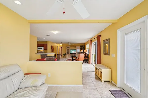 a living room with furniture and a table