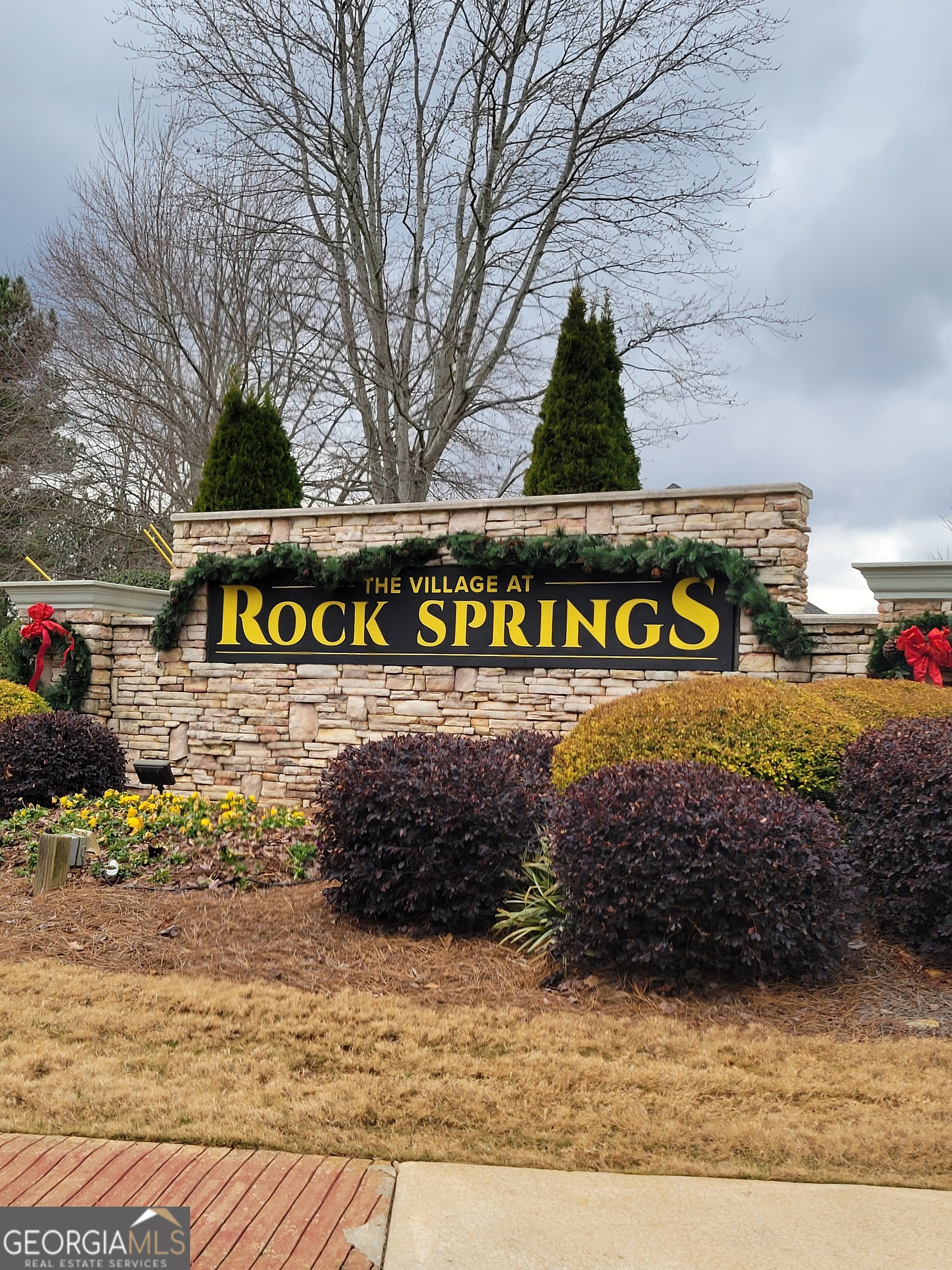 3387 Baymount Way Lawrenceville, GA 30043 - Photo 3 of 7 a view of outdoor space with sign board
