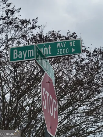 a view of swimming pool and trees