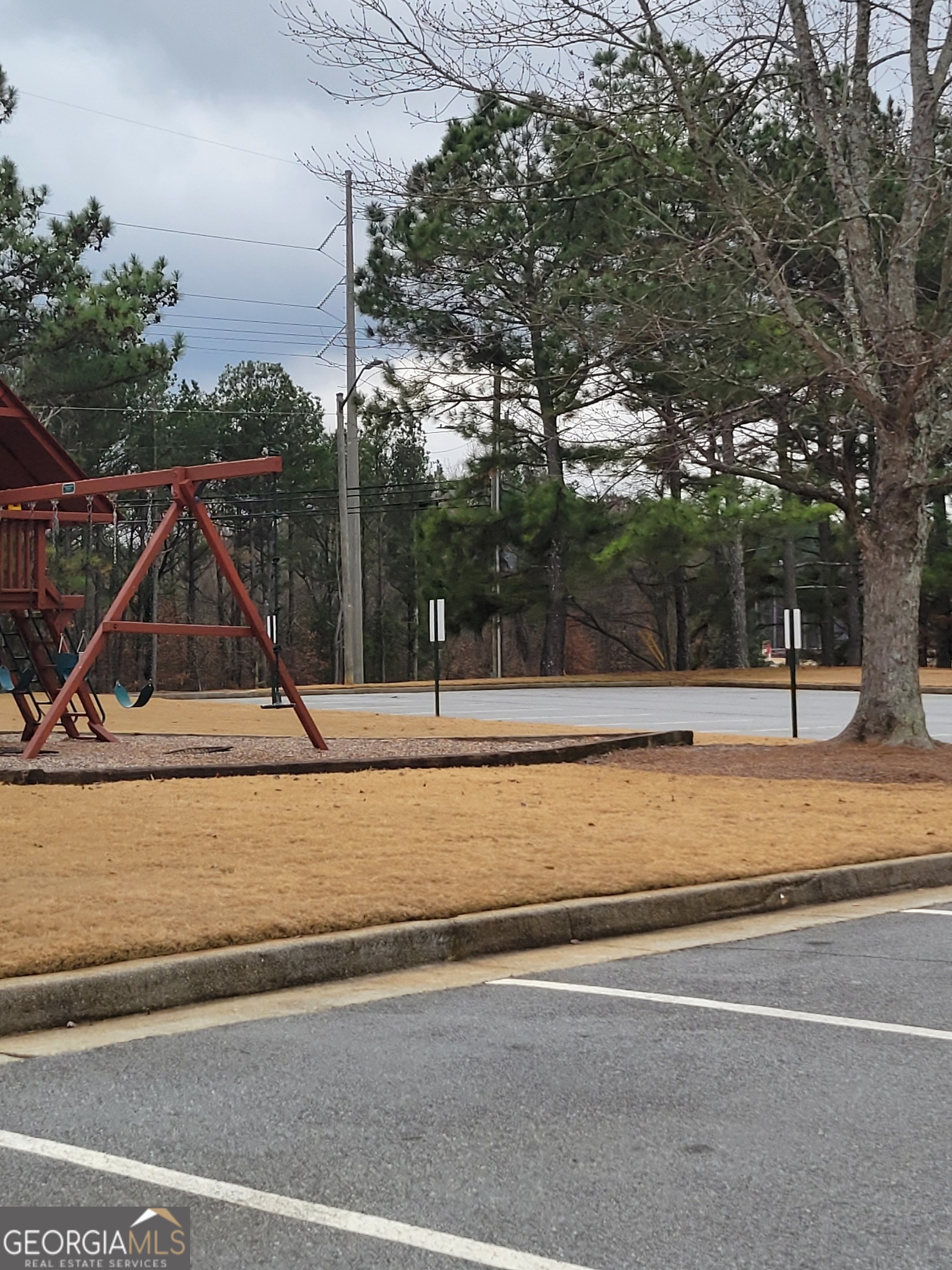 3387 Baymount Way Lawrenceville, GA 30043 - Photo 6 of 7 a view of a house with a park