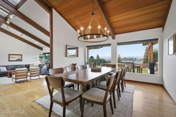 a living room with furniture fireplace and a flat screen tv