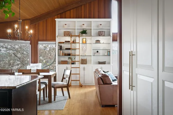 a kitchen with appliances cabinets and a counter top space
